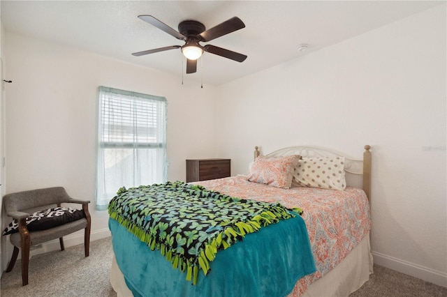 bedroom featuring ceiling fan and carpet floors