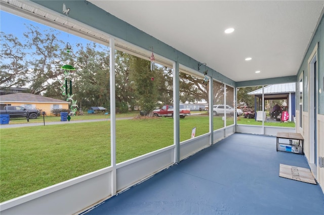 unfurnished sunroom with a healthy amount of sunlight