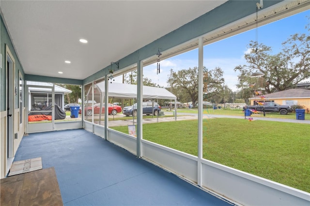 unfurnished sunroom with a healthy amount of sunlight