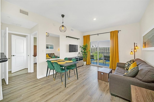 living room featuring light wood-type flooring