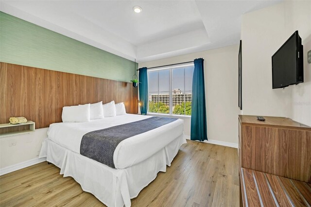 bedroom with light wood-type flooring