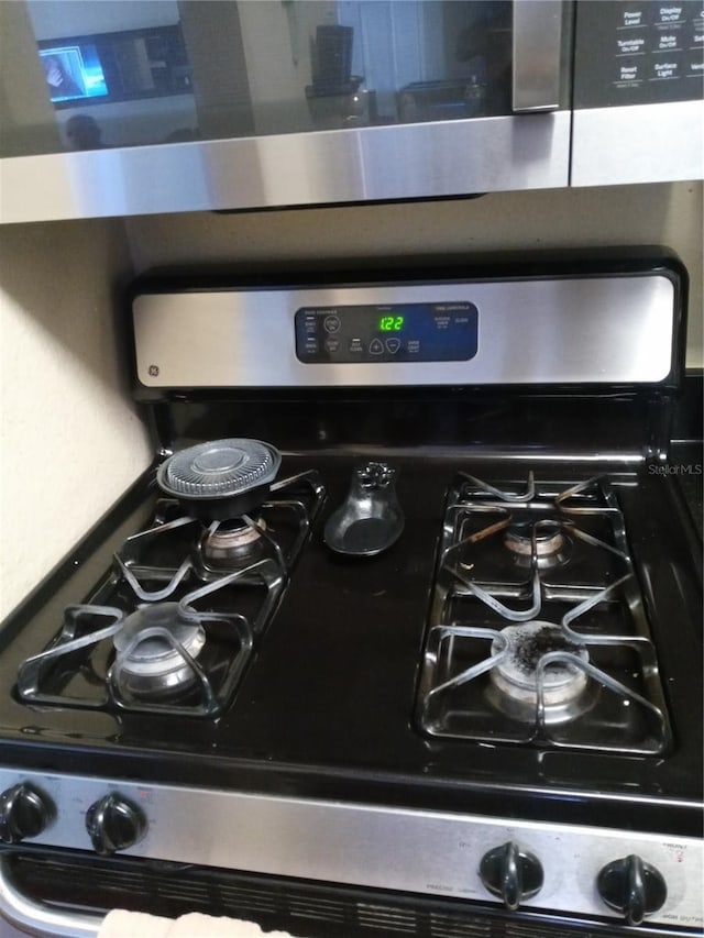 interior details featuring stainless steel range with gas cooktop