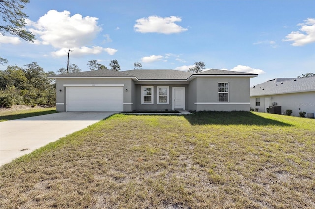 single story home with a garage, a front lawn, and central air condition unit