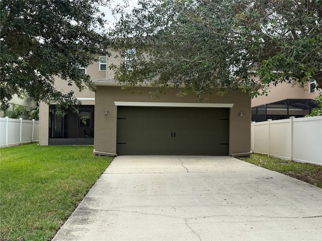 garage with a yard