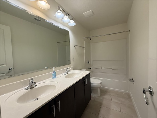 full bathroom featuring bathing tub / shower combination, tile patterned flooring, vanity, and toilet