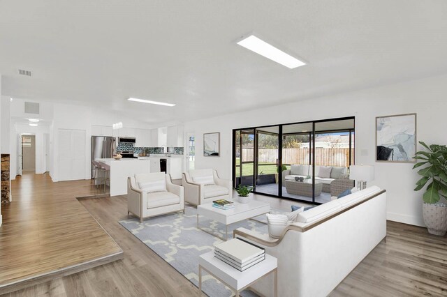 living room featuring light hardwood / wood-style floors