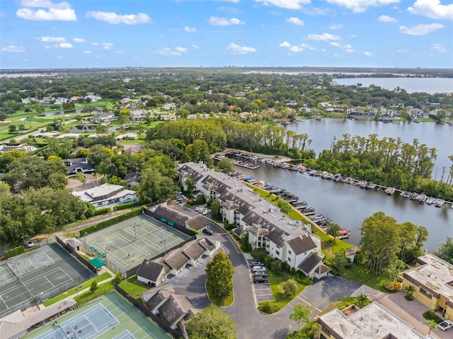 birds eye view of property with a water view