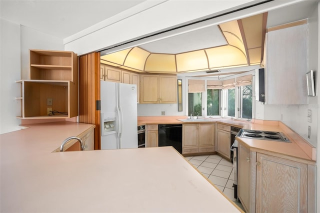 kitchen with light brown cabinetry, sink, light tile patterned floors, and black appliances