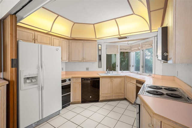 kitchen featuring dishwasher, light brown cabinets, white refrigerator with ice dispenser, sink, and light tile patterned floors