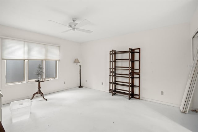 unfurnished room with ceiling fan