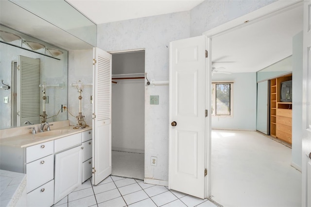 bathroom featuring vanity, tile patterned floors, and ceiling fan