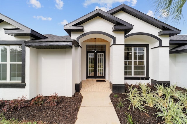 entrance to property featuring french doors