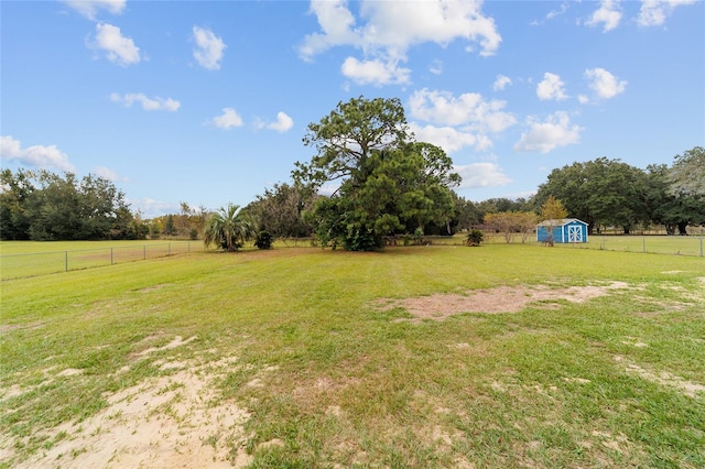 view of yard with a rural view