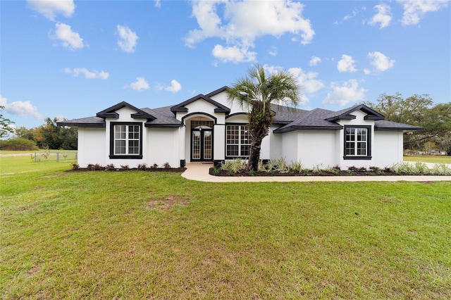 ranch-style house with a front yard