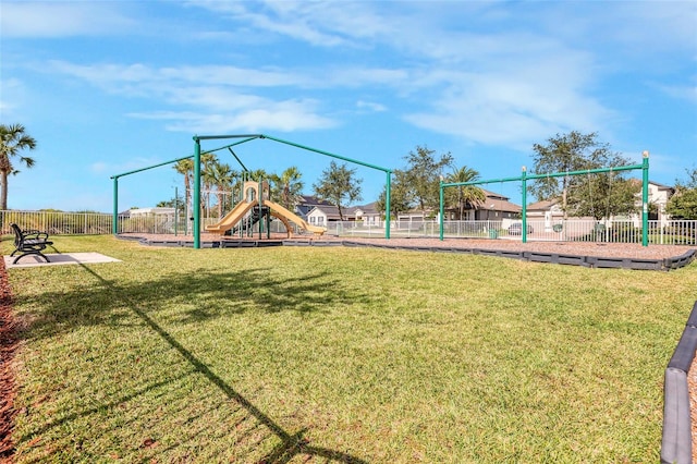 view of playground with a yard