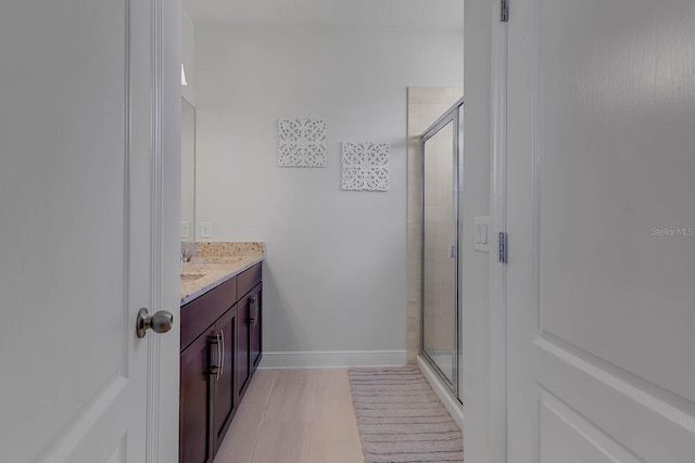 bathroom featuring vanity and walk in shower