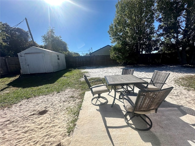 view of patio / terrace featuring a storage shed