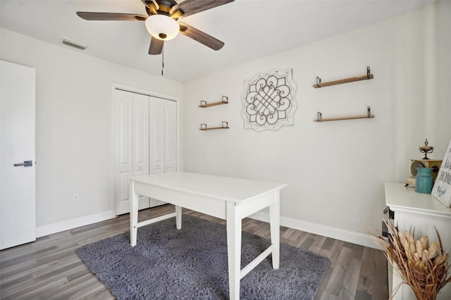 office area with ceiling fan and hardwood / wood-style floors