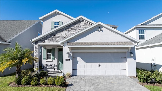 view of front of home with a garage