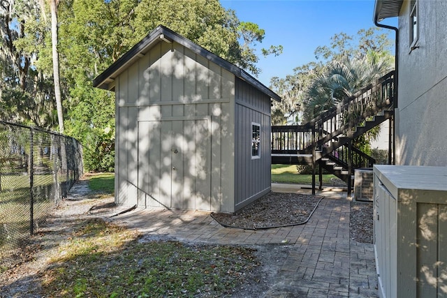 view of outdoor structure featuring central AC unit