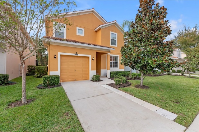 view of front of home with a garage and a front lawn