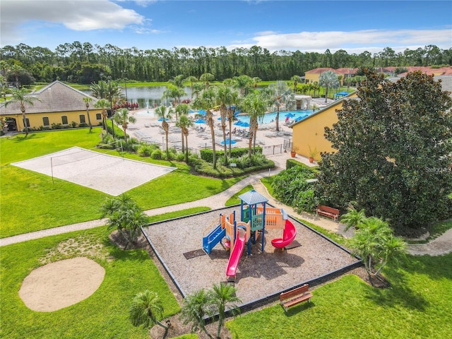 birds eye view of property with a water view