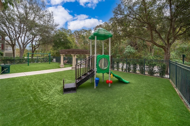 view of play area with a yard