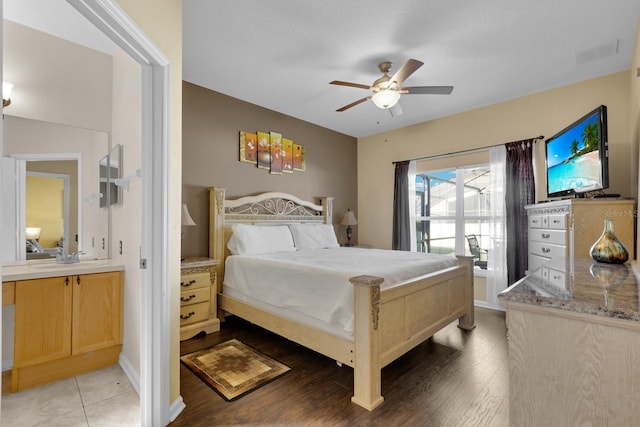 bedroom with hardwood / wood-style flooring and ceiling fan