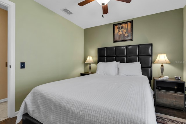 bedroom featuring ceiling fan and wood-type flooring