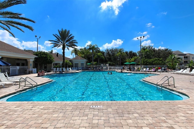 view of swimming pool featuring a patio