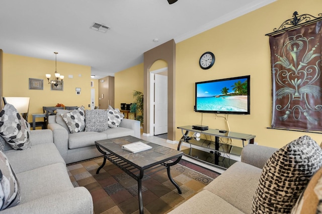 living room featuring a chandelier