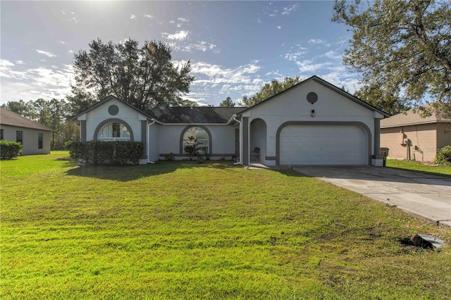 ranch-style home featuring a garage and a front yard