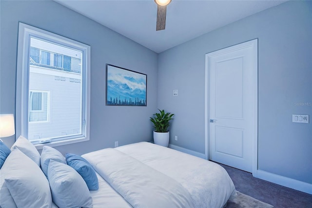 carpeted bedroom featuring ceiling fan