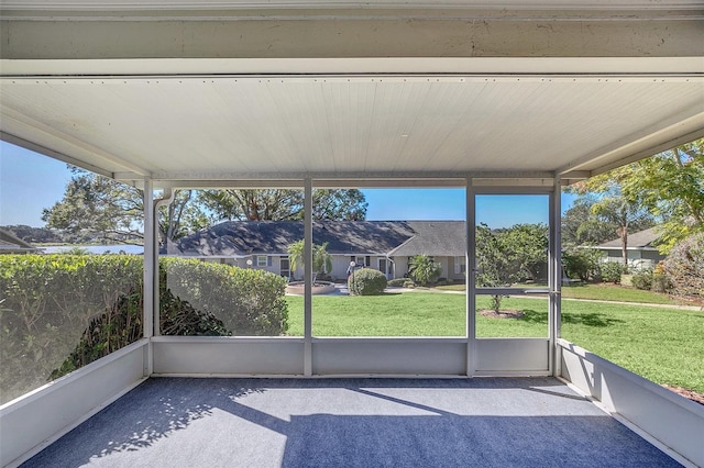 unfurnished sunroom featuring a wealth of natural light