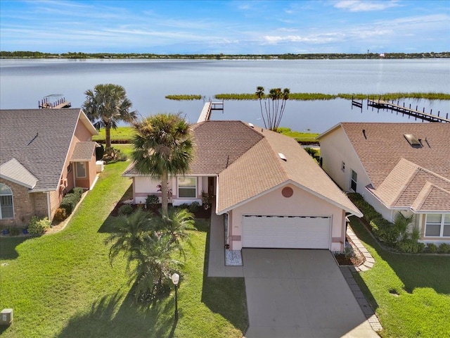 birds eye view of property featuring a water view