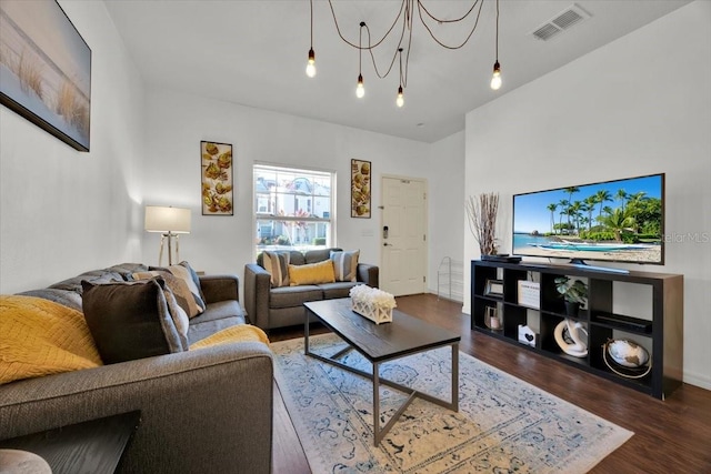 living room with dark wood-type flooring