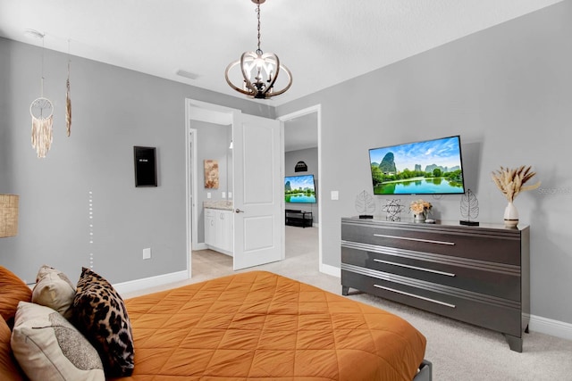 bedroom featuring ensuite bathroom, light colored carpet, and a notable chandelier