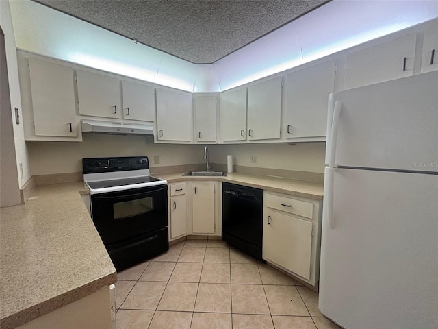 kitchen featuring light tile patterned floors, sink, white cabinetry, and black appliances