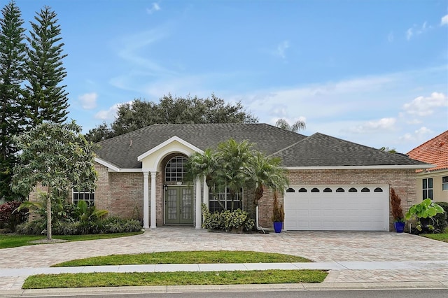 single story home with a garage