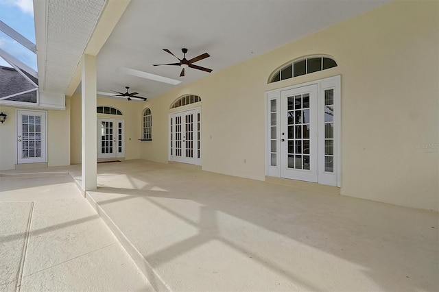 view of patio featuring french doors and ceiling fan