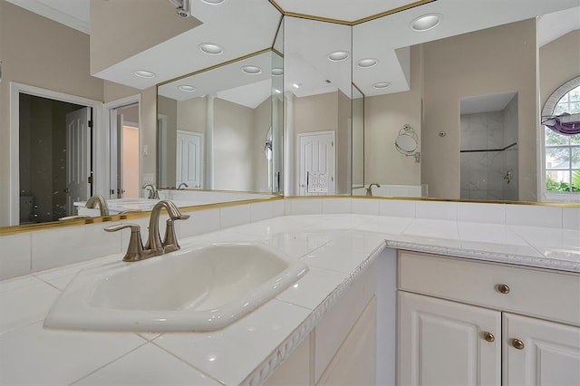 bathroom with vanity and walk in shower