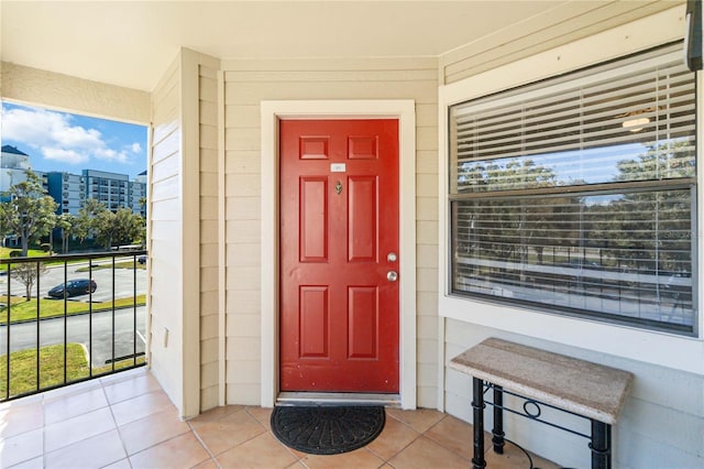 entrance to property with a balcony