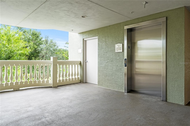 balcony featuring elevator