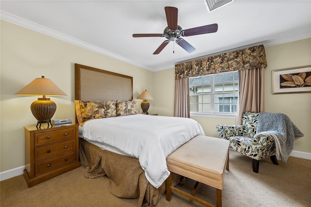 bedroom with ceiling fan, light colored carpet, and ornamental molding