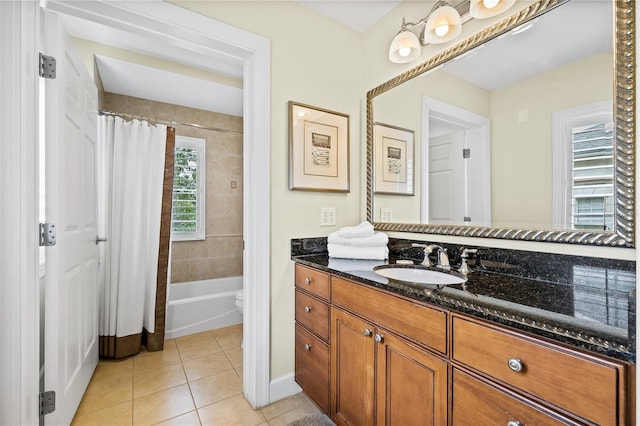 1370 Centre Court Ridge Dr Unit 304, Kissimmee, FL 34747 - bathroom with vanity, tile patterned floors, shower / tub combo, toilet, and baseboards
