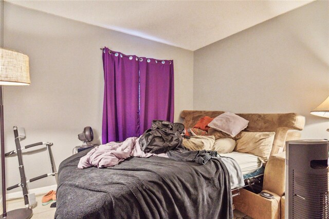 bedroom with vaulted ceiling