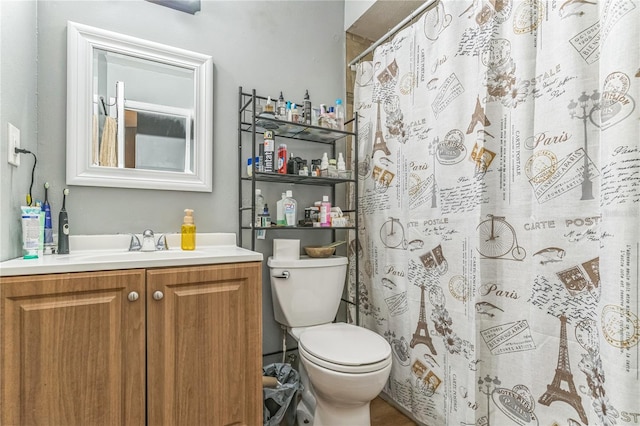 bathroom with vanity and toilet