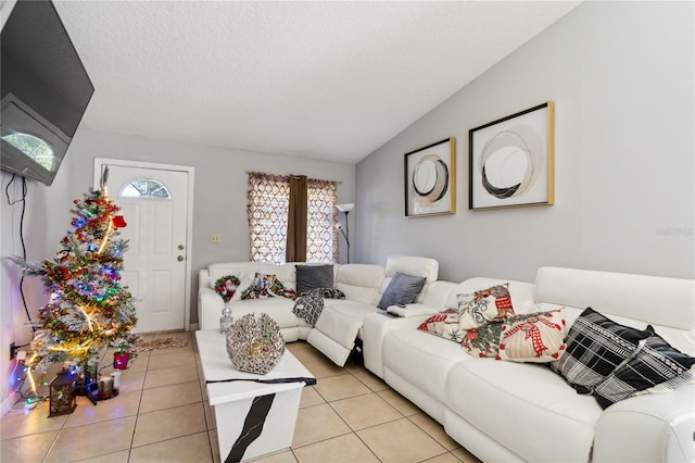 tiled living room with a textured ceiling