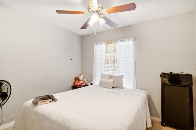 bedroom featuring ceiling fan