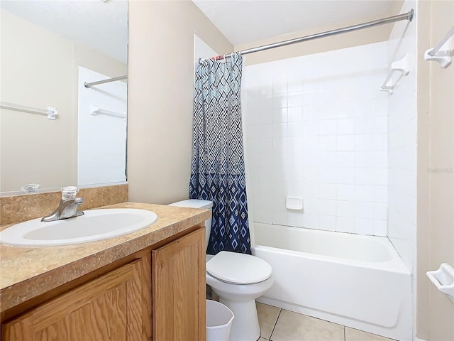 full bathroom with tile patterned floors, shower / bath combo with shower curtain, vanity, and toilet